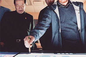 Harker students showing the anatomy table to forensic scientist extraordinaire, Henry Lee.